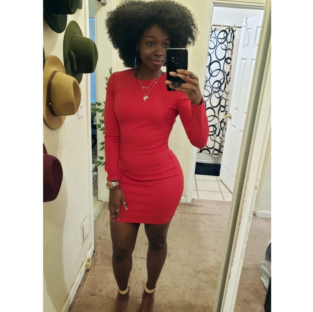 Red long sleeved formal dress